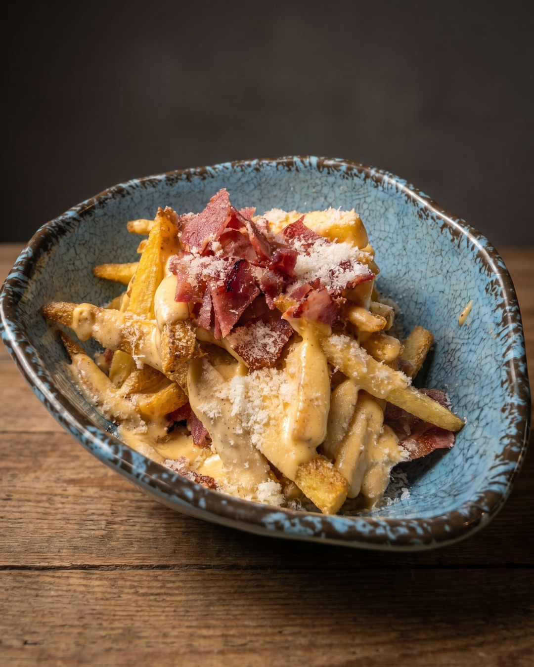 Loaded fries with bacon and parmesan